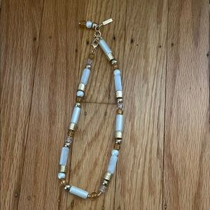 Elegant Gold and White Beaded Necklace